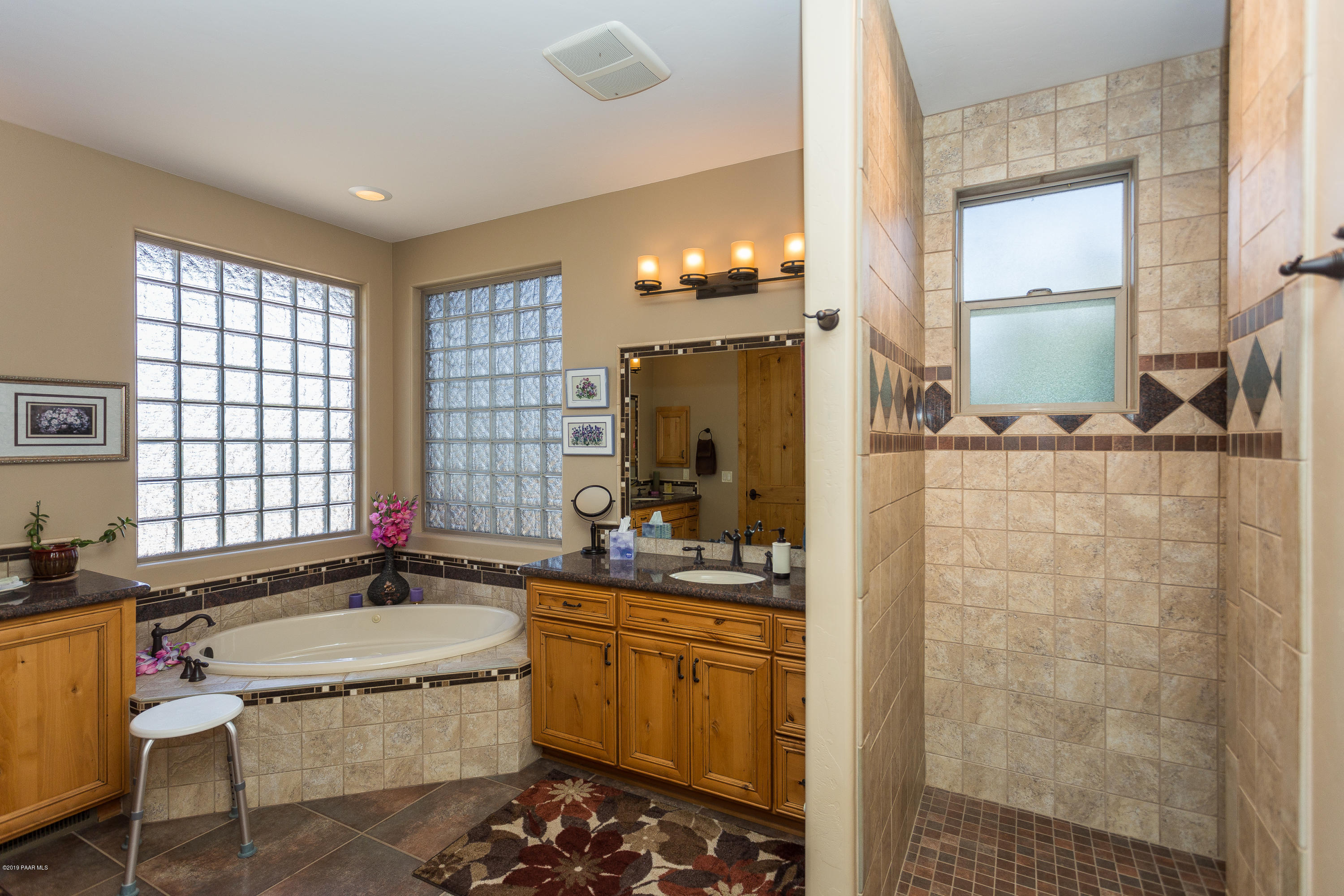 7301 Dillon Wash Road Prescott, AZ 86305 - Photo 16 of 36 a bathroom with a sink and a mirror