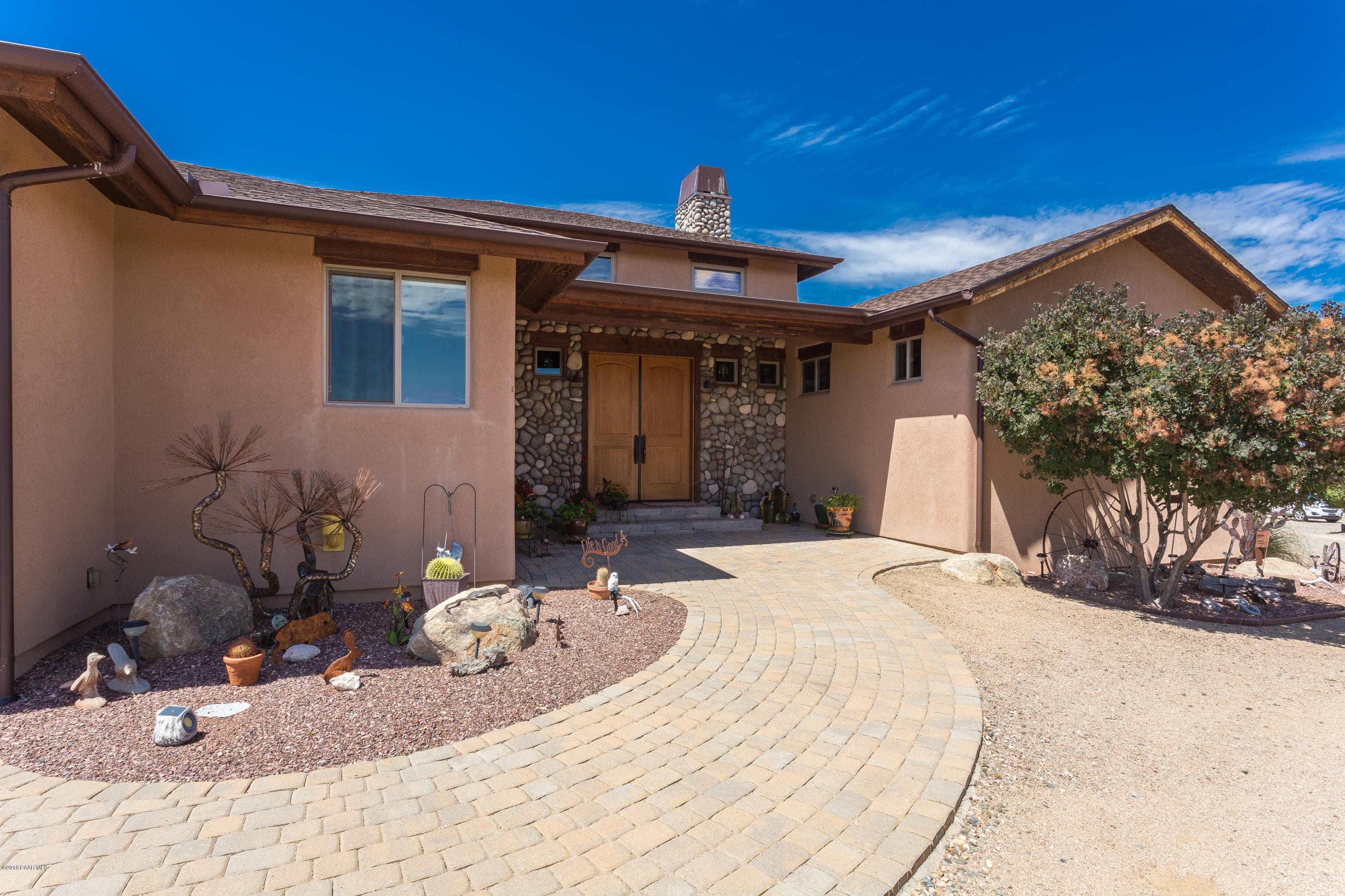 7301 Dillon Wash Road Prescott, AZ 86305 - Photo 3 of 36 a view of a house with a patio