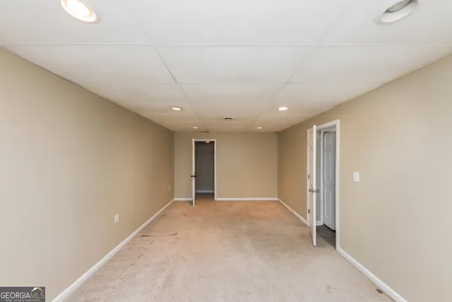 a view of hallway with a large window
