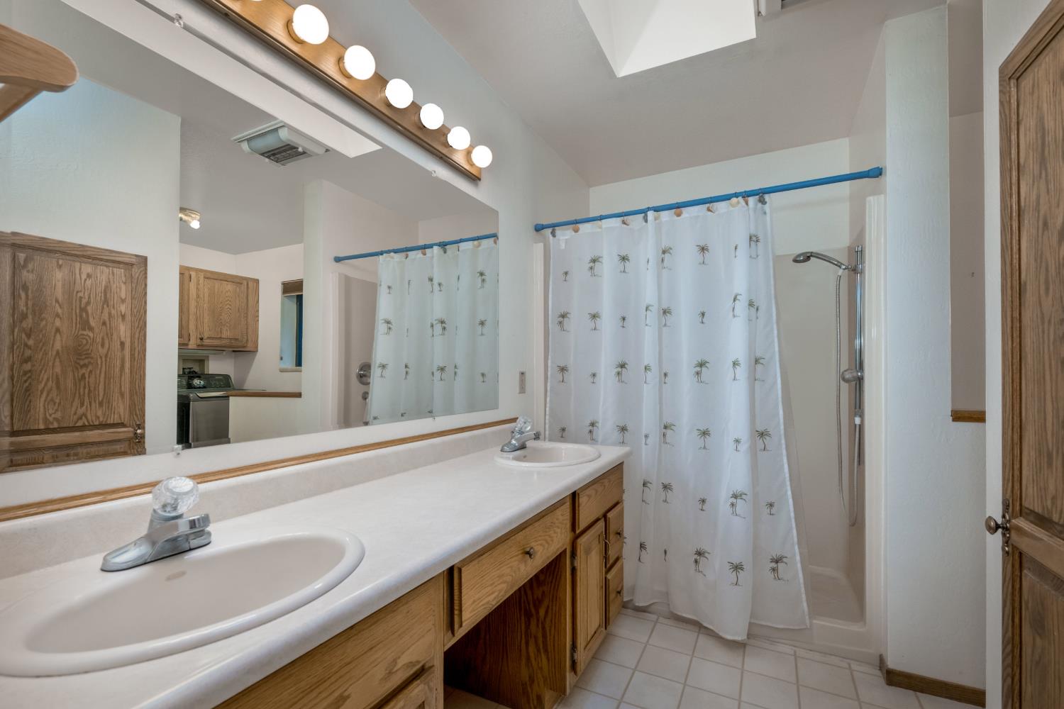 15501 Little Valley Road Grass Valley, CA 95949 - Photo 31 of 48 Primary Bedroom Bathroom with skylight