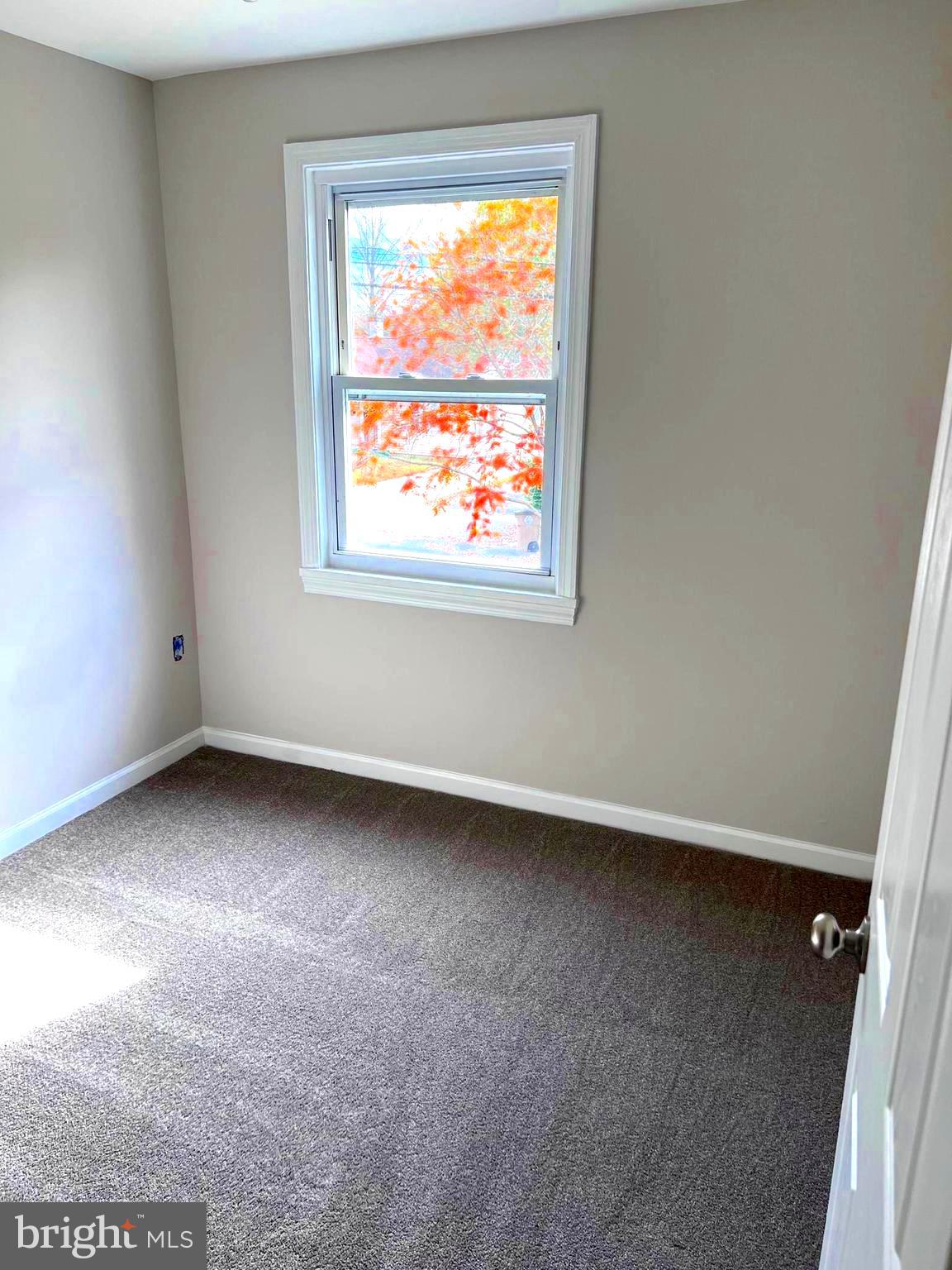 708 Crabb Avenue Rockville, MD 20850 - Photo 11 of 24 an empty room with a window