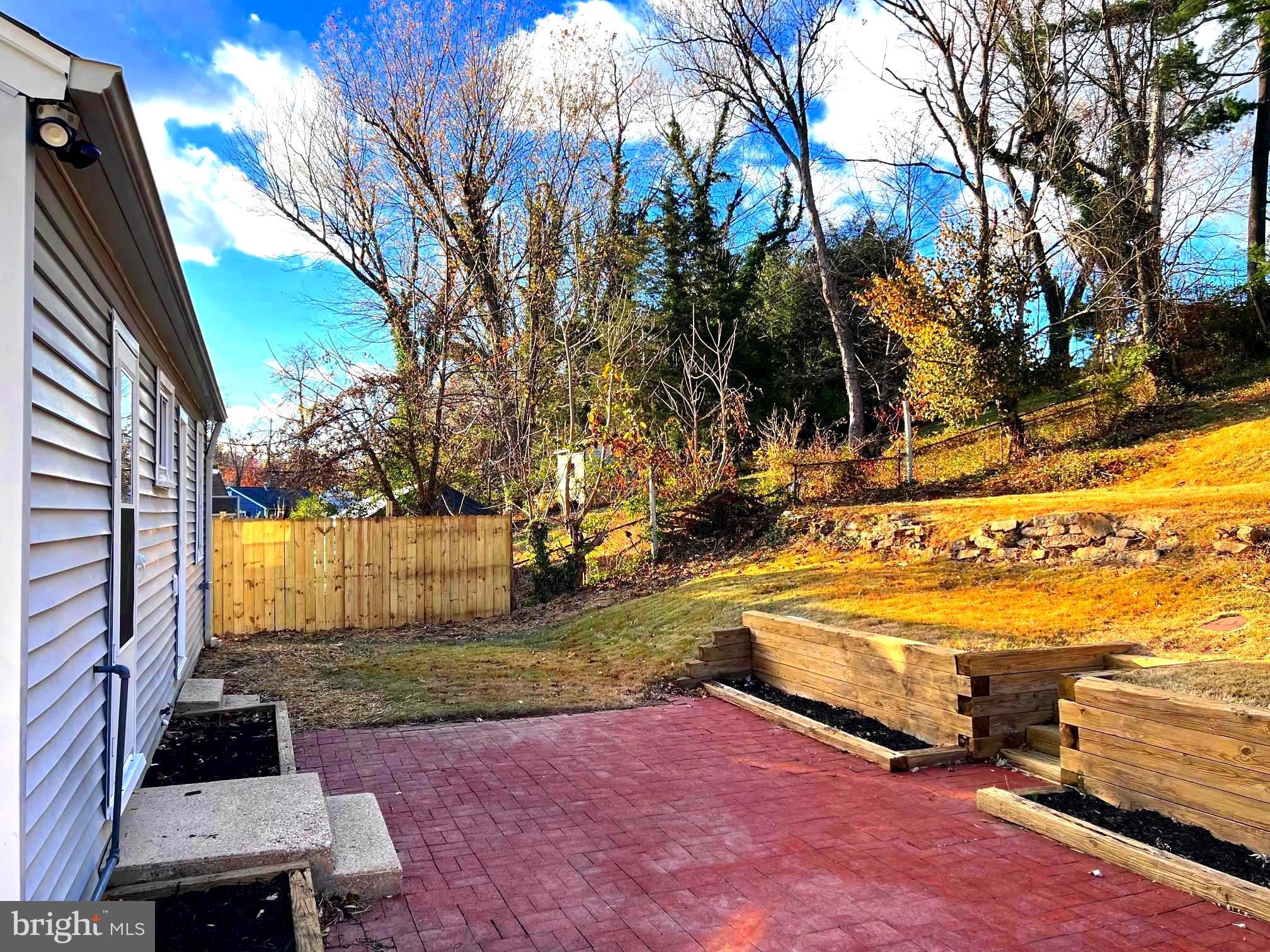 708 Crabb Avenue Rockville, MD 20850 - Photo 15 of 24 a view of yard with swimming pool and sitting area