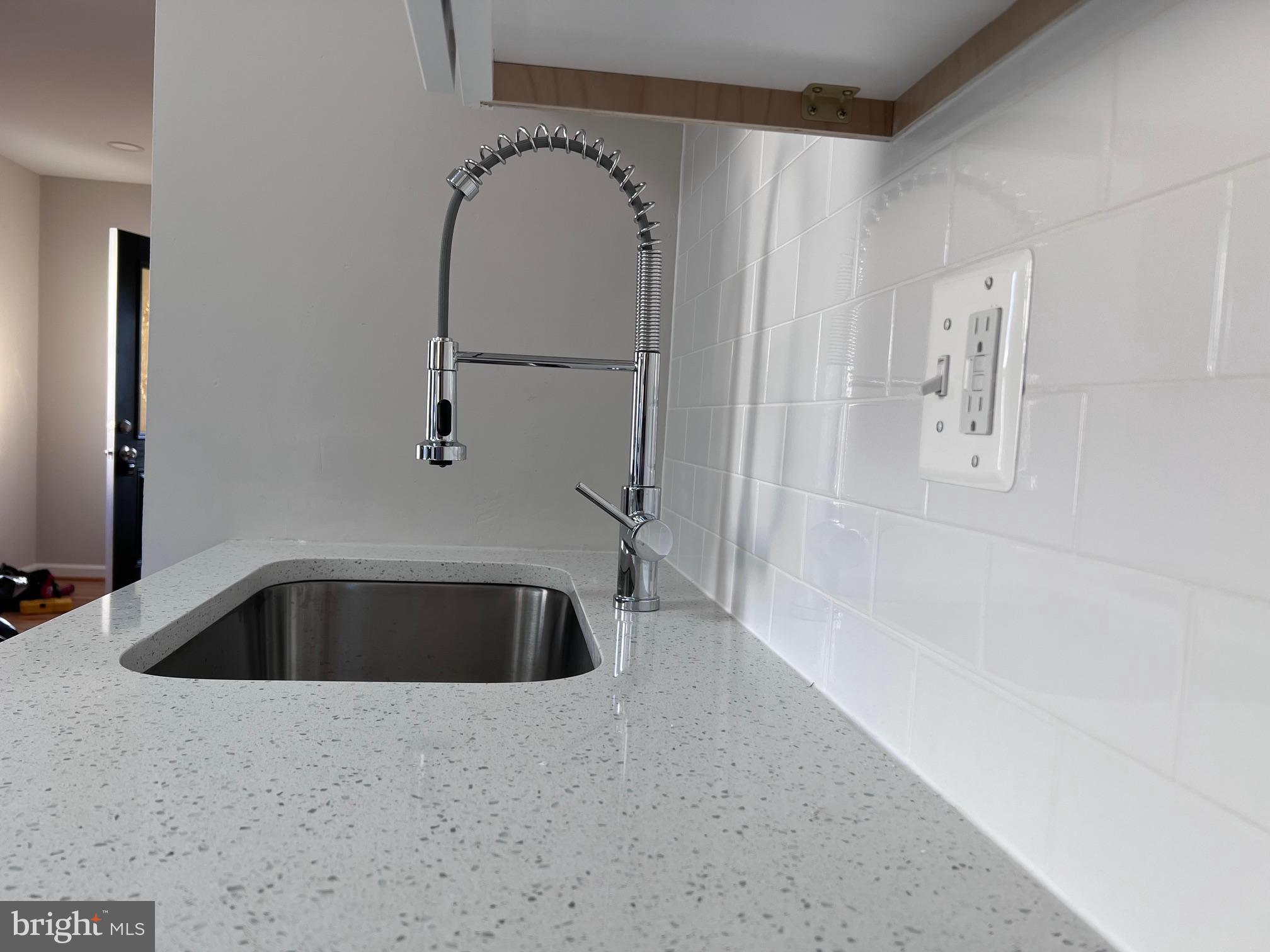 708 Crabb Avenue Rockville, MD 20850 - Photo 6 of 24 a bathroom with a bathtub