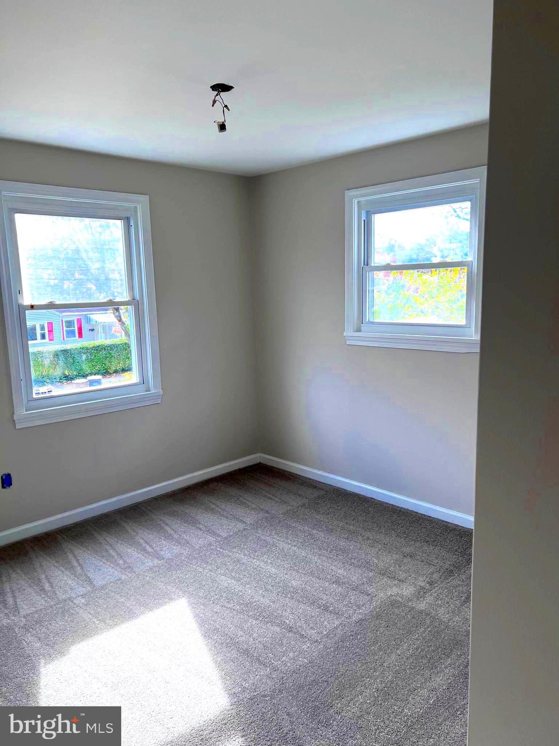 708 Crabb Avenue Rockville, MD 20850 - Photo 10 of 24 a view of an empty room with a window