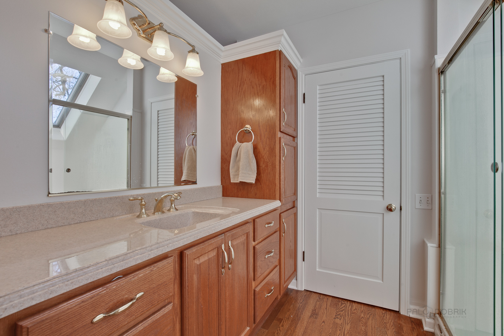 1991 Pheasant Trail Inverness, IL 60067 - Photo 34 of 53 a bathroom with a sink and a mirror