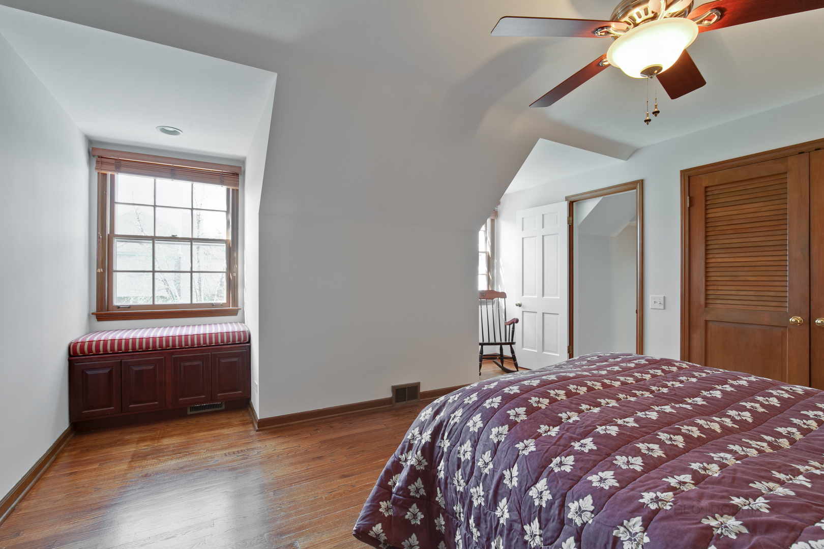 1991 Pheasant Trail Inverness, IL 60067 - Photo 35 of 53 a bedroom with a bed and a chandelier