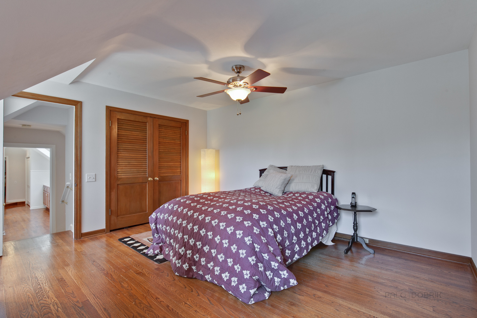 1991 Pheasant Trail Inverness, IL 60067 - Photo 36 of 53 a bedroom with a bed and a chandelier