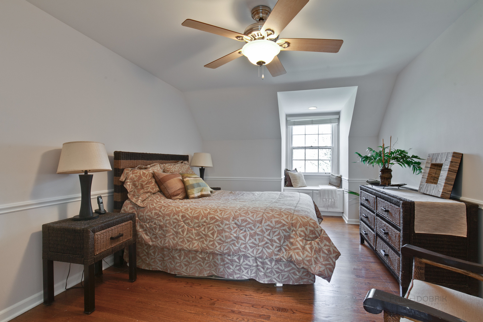 1991 Pheasant Trail Inverness, IL 60067 - Photo 40 of 53 a bedroom with a bed and a chandelier
