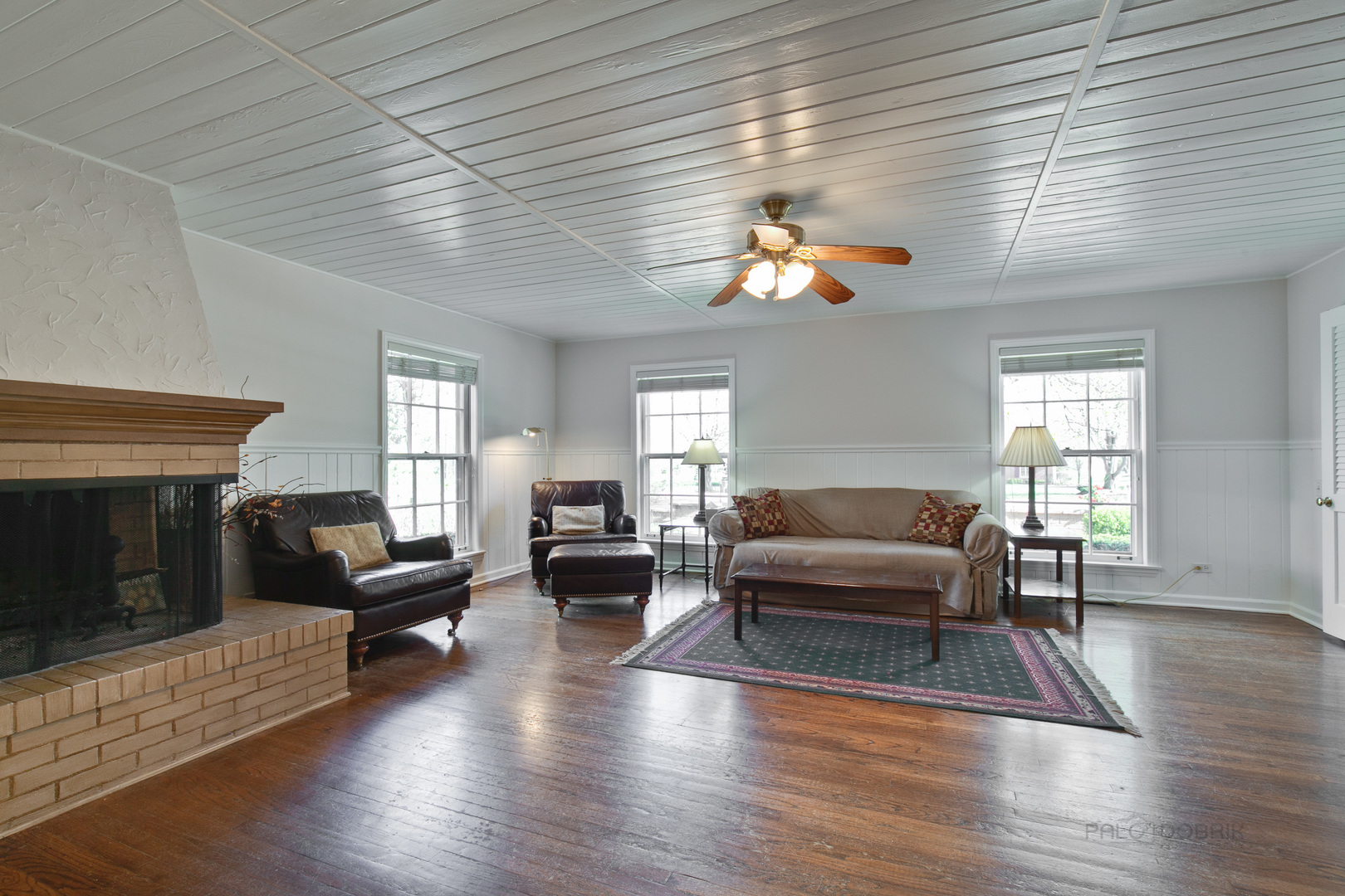 1991 Pheasant Trail Inverness, IL 60067 - Photo 9 of 53 a living room with furniture a fireplace and wooden floor
