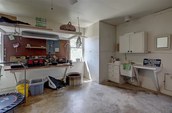 a view of a yard with large trees