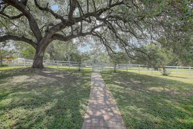 a view of swimming pool from a balcony