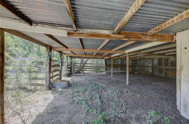 a view of parking garage with cars