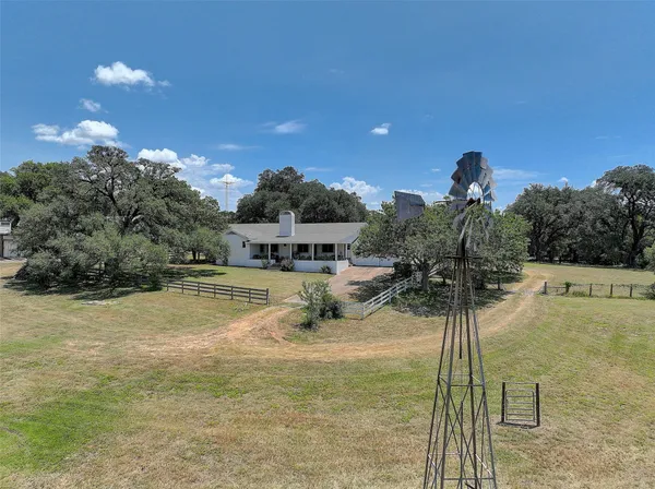 a view of a swimming pool with a garden
