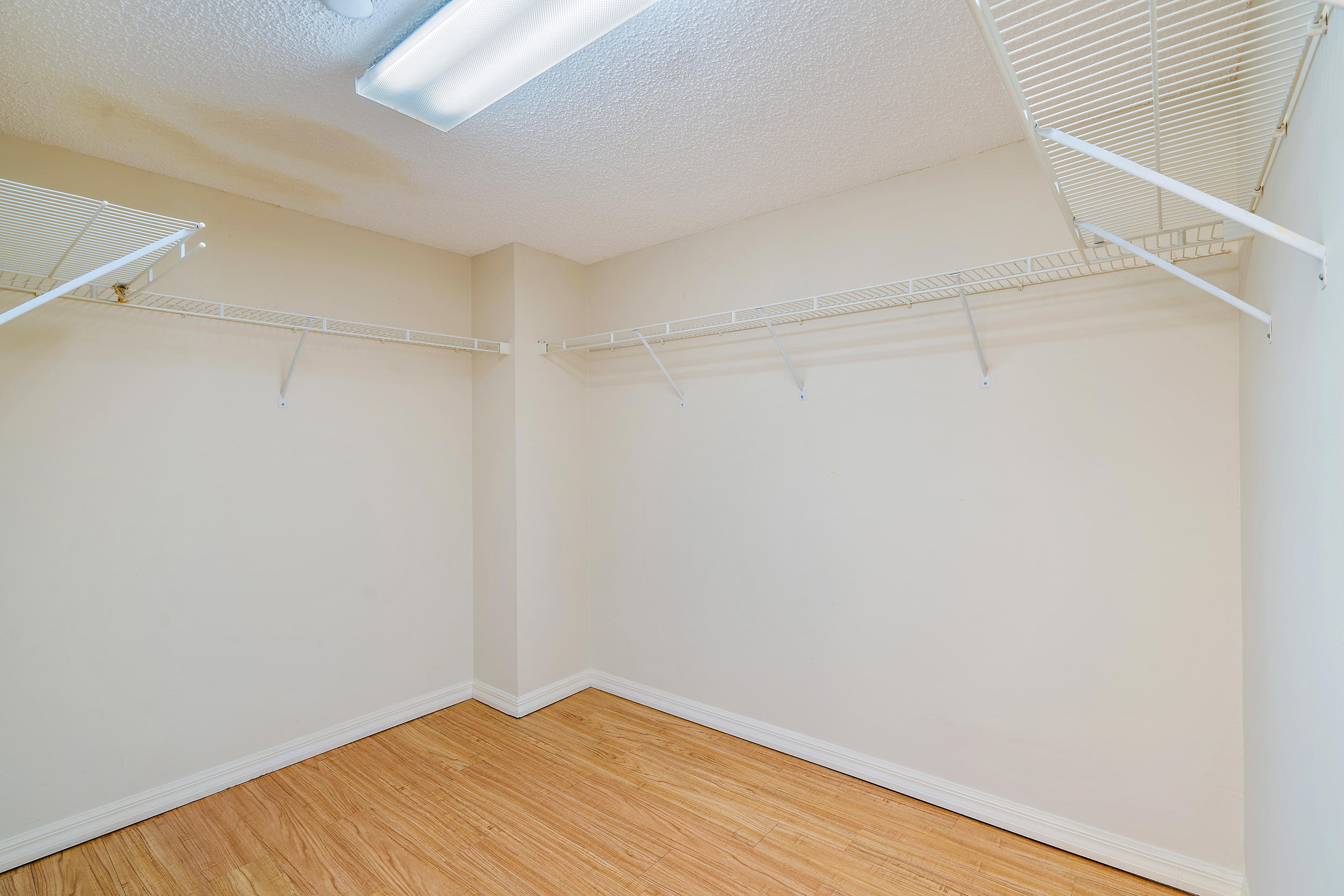 320 Northwest 67th Street, Unit C107 Boca Raton, FL 33487 - Photo 10 of 22 Master Bedroom Walk in Closet!