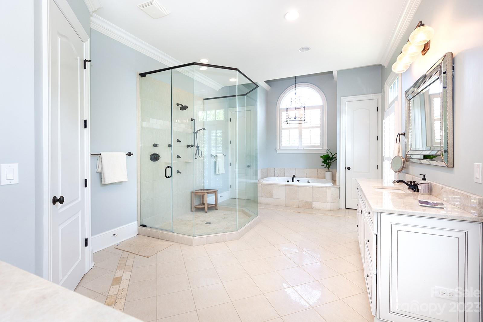 1925 Shoreham Drive Charlotte, NC 28211 - Photo 14 of 48 a bathroom with a sink a toilet and shower