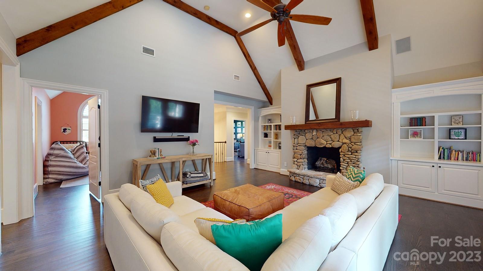 1925 Shoreham Drive Charlotte, NC 28211 - Photo 19 of 48 a living room with furniture and a flat screen tv