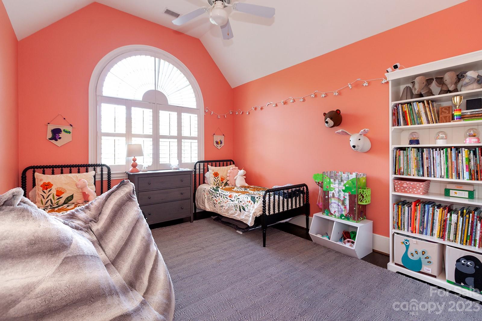 1925 Shoreham Drive Charlotte, NC 28211 - Photo 20 of 48 a bedroom with furniture and a book shelf