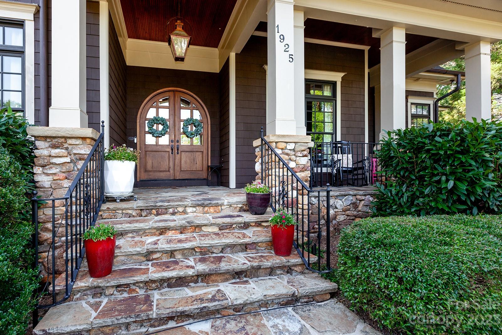1925 Shoreham Drive Charlotte, NC 28211 - Photo 2 of 48 a front view of a house with outdoor seating