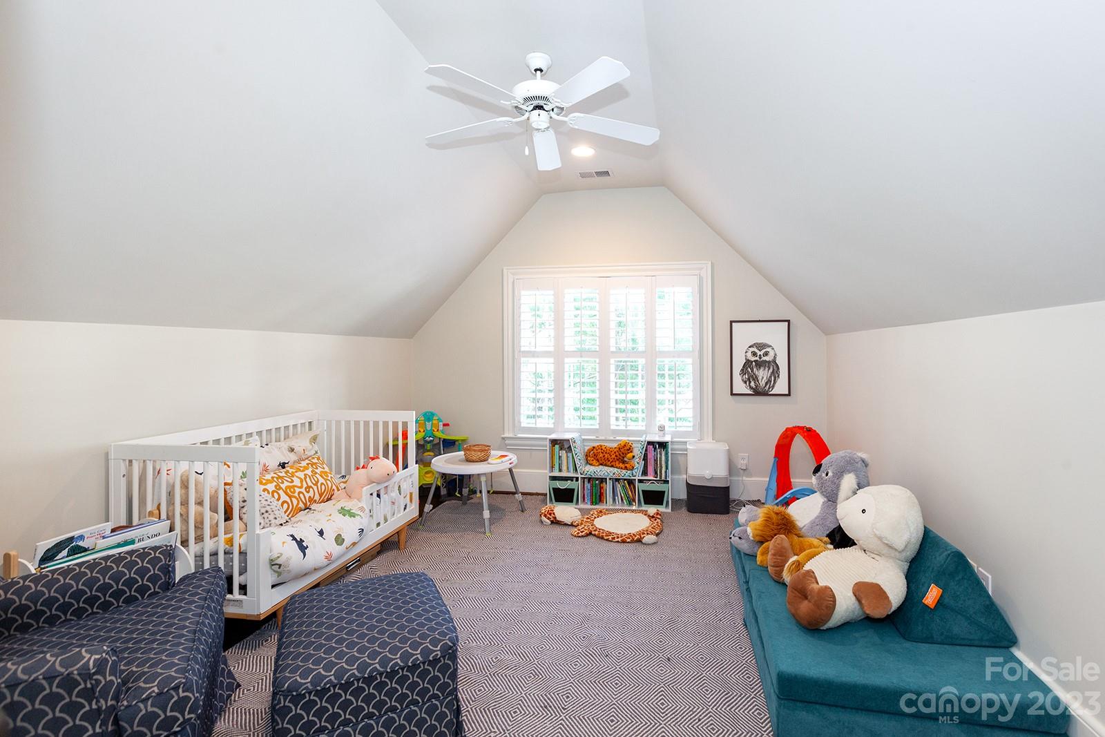 1925 Shoreham Drive Charlotte, NC 28211 - Photo 22 of 48 a bedroom with furniture and a large window