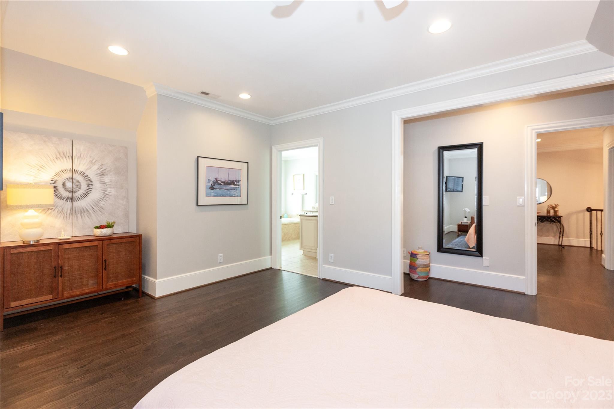 1925 Shoreham Drive Charlotte, NC 28211 - Photo 26 of 48 a bedroom with a bed and wooden floor