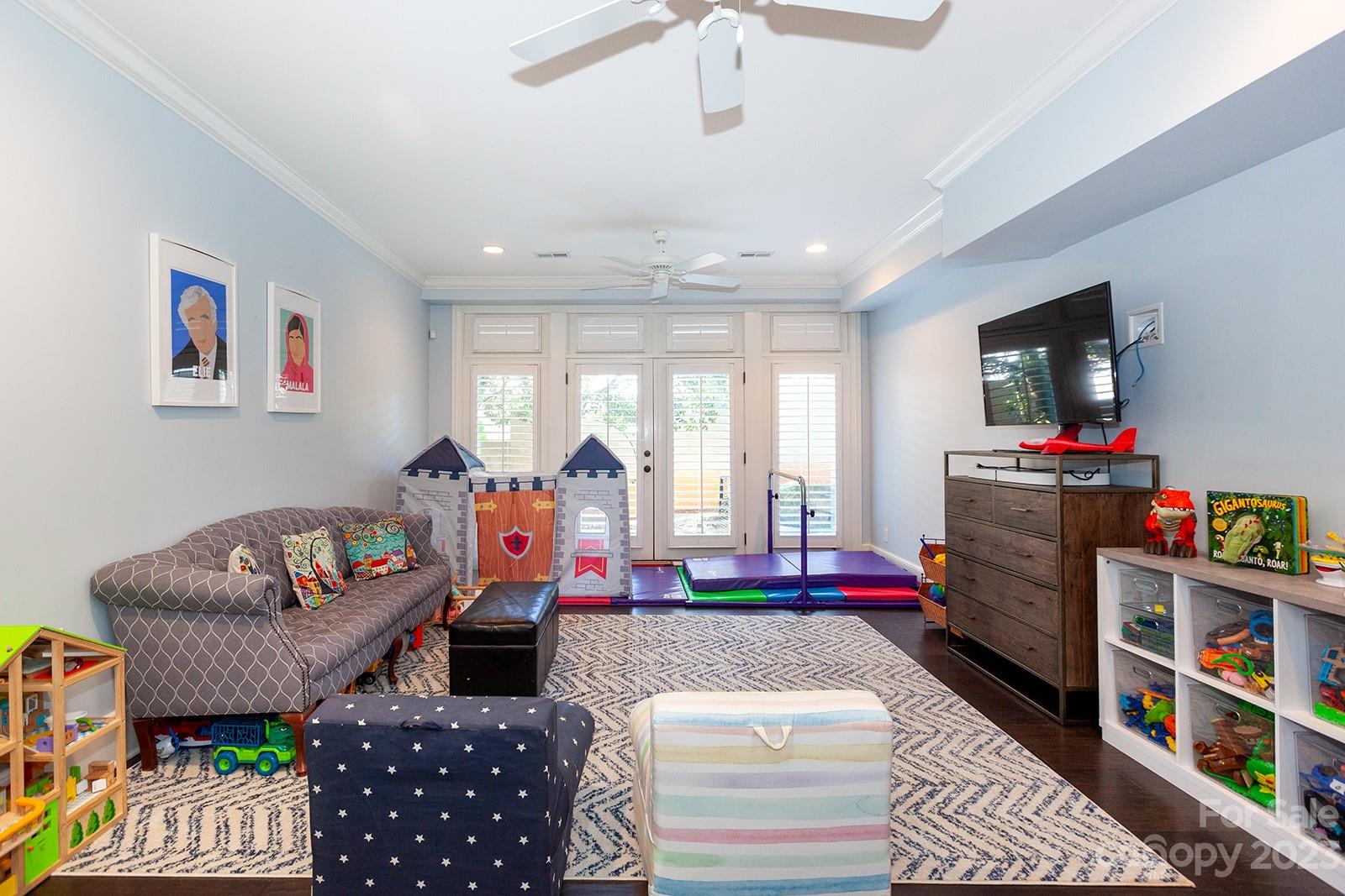 1925 Shoreham Drive Charlotte, NC 28211 - Photo 33 of 48 a living room with furniture and a flat screen tv