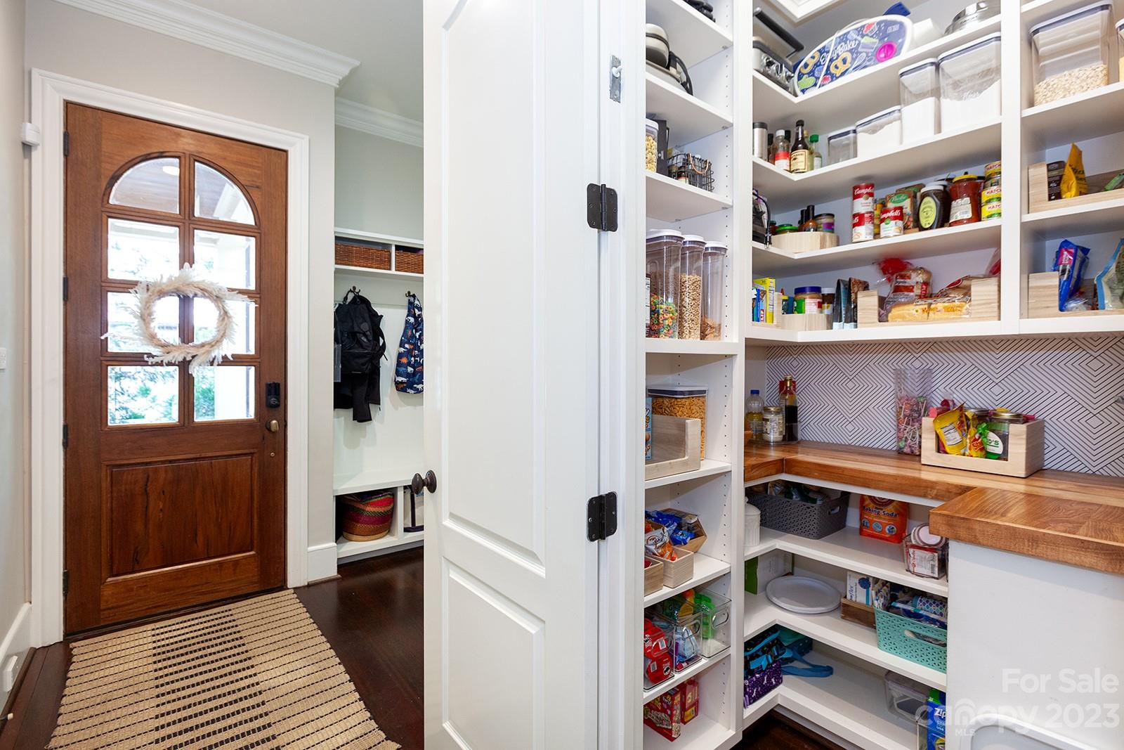 1925 Shoreham Drive Charlotte, NC 28211 - Photo 36 of 48 a view of walk in closet with clothes and shoes