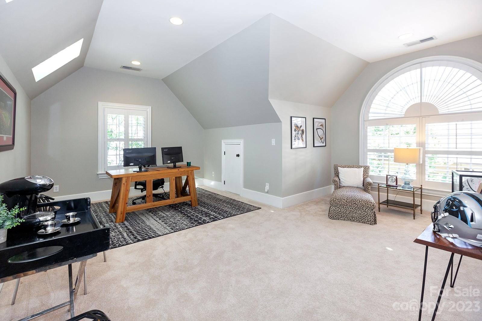 1925 Shoreham Drive Charlotte, NC 28211 - Photo 42 of 48 a bedroom with furniture and a large window