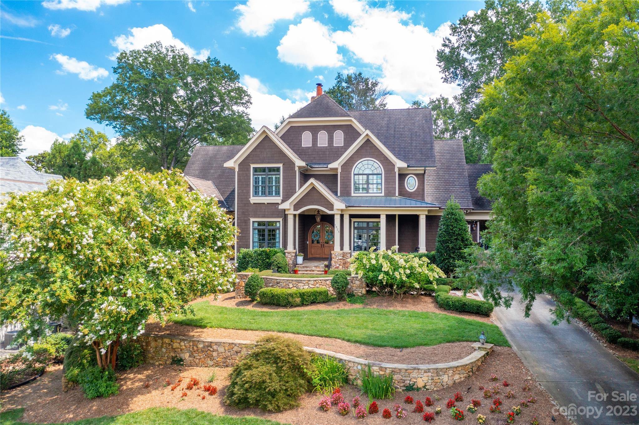 1925 Shoreham Drive Charlotte, NC 28211 - Photo 47 of 48 a front view of a house with a garden