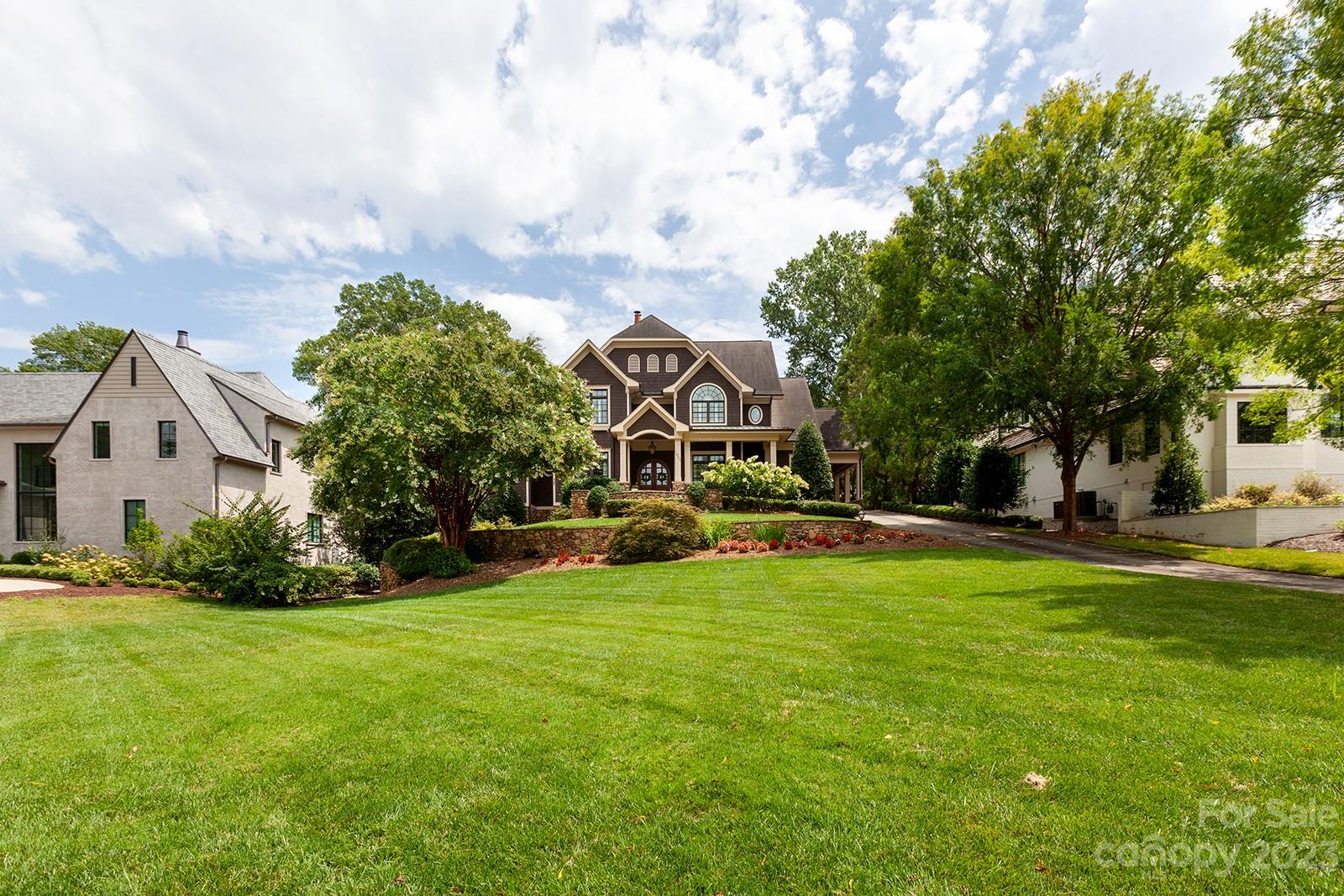 1925 Shoreham Drive Charlotte, NC 28211 - Photo 48 of 48 a view of a house with a big yard and large trees