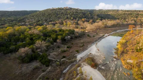 a view of a lake with a mountain in the background