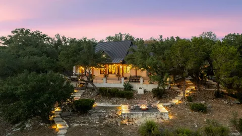 a view of a water fountain in front of the house