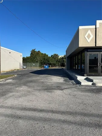 a view of a building with a street