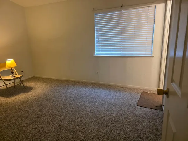 a view of a room with a window