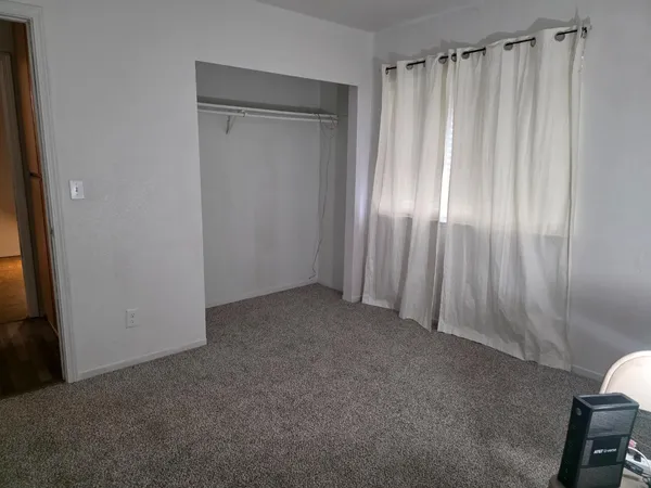a view of a room with a window
