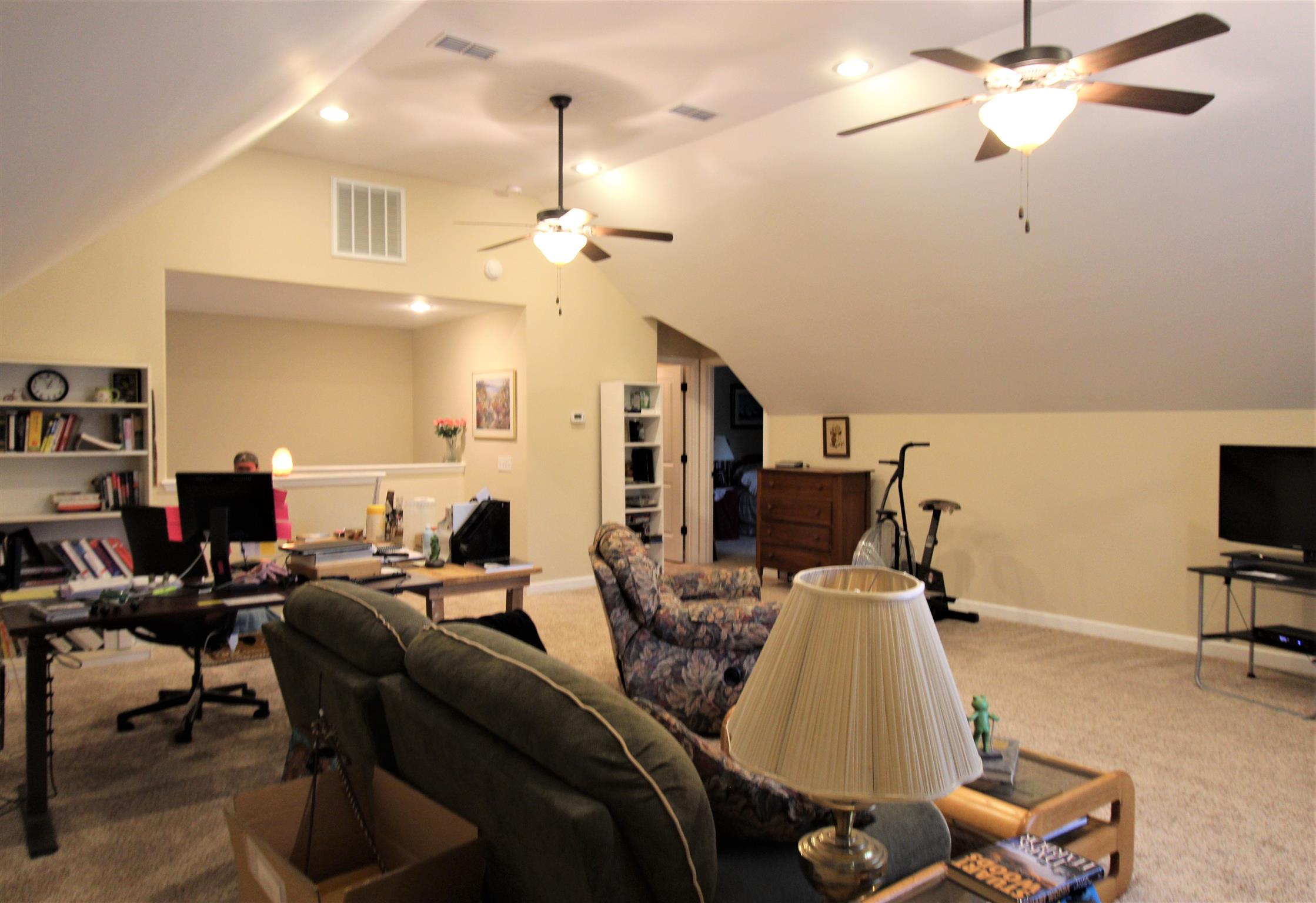 396 Abbey Road Lebanon, TN 37090 - Photo 16 of 23 a room with gym equipment and a flat screen tv
