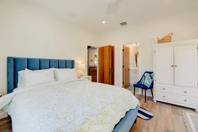 a bed room with a bed and furniture