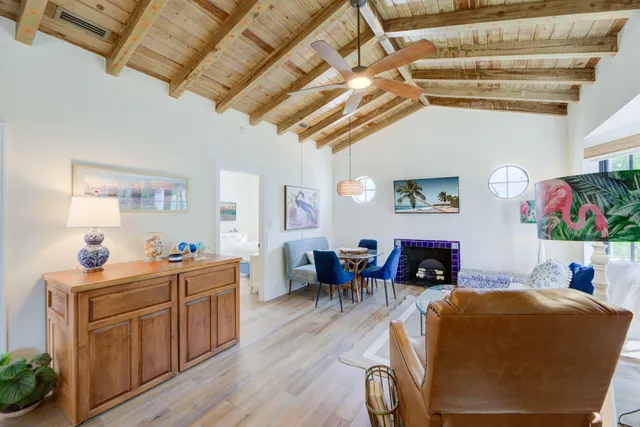 a bed room with furniture and wooden floor