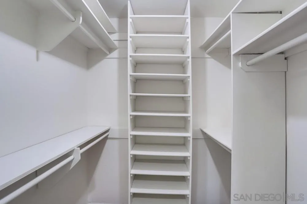 6314 Friars Road, Unit 116 San Diego, CA 92108 - Photo 16 of 36 a view of walk in closet with empty racks
