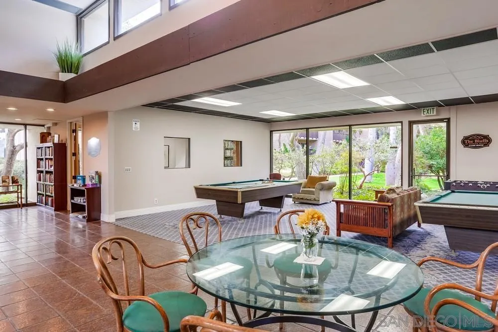 6314 Friars Road, Unit 116 San Diego, CA 92108 - Photo 31 of 36 a dining room with furniture mountain view and wooden floor