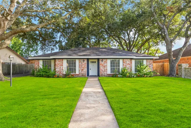 front view of a house and a yard