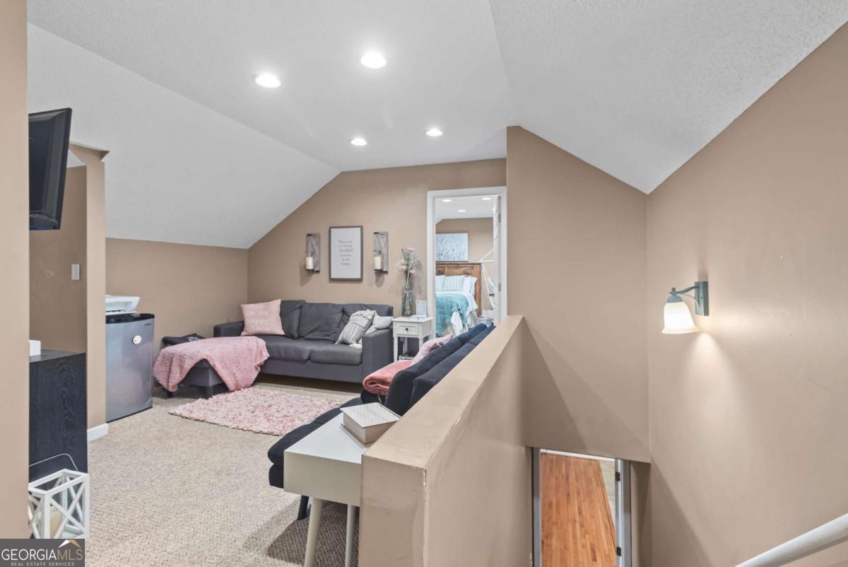 513 South Red Rock Road Toccoa, GA 30577 - Photo 28 of 47 a living room with furniture and a lamp