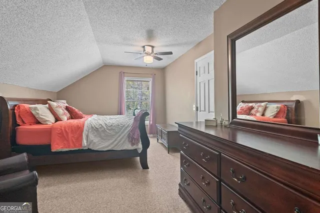 a view of outdoor space with signage and flags