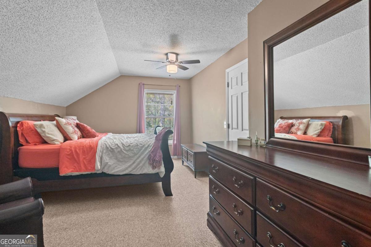 513 South Red Rock Road Toccoa, GA 30577 - Photo 36 of 47 a bedroom with a bed and a dresser