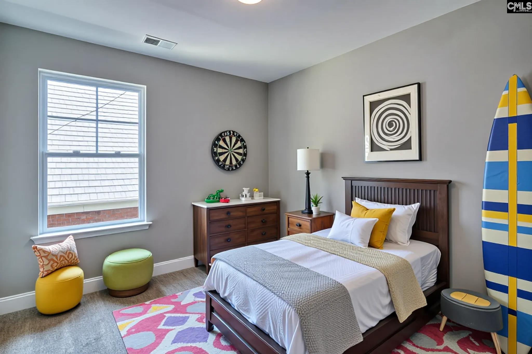 259 Eastover Road Eastover, SC 29044 - Photo 11 of 16 a bedroom with a bed and a chair