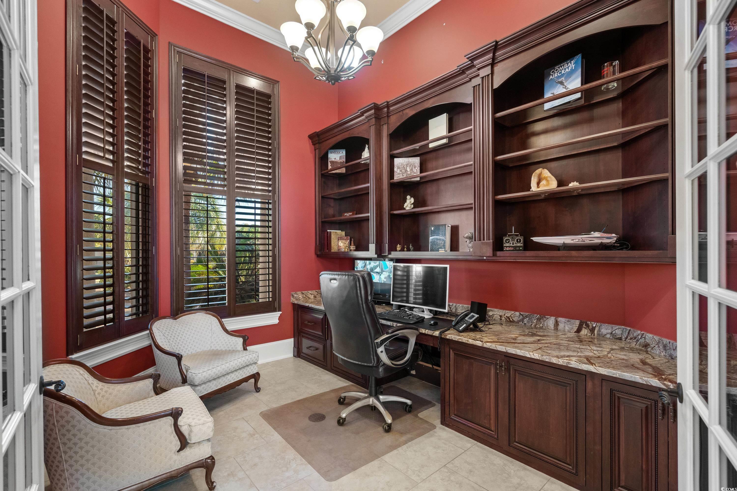 9237 Bellasera Circle Myrtle Beach, SC 29579 - Photo 6 of 34 Office area with built in study area, a chandelier, ornamental molding, and light tile patterned floors