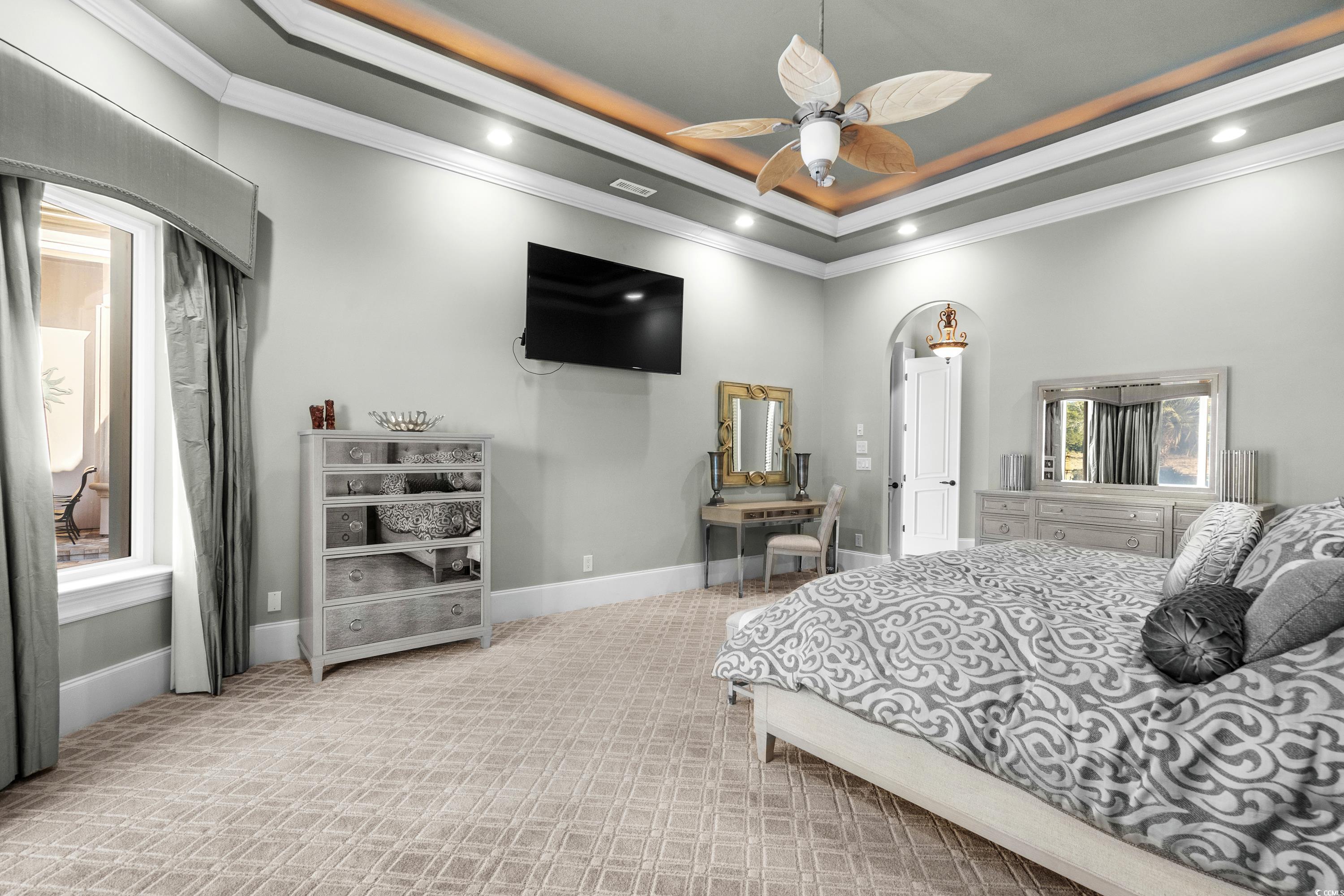 9237 Bellasera Circle Myrtle Beach, SC 29579 - Photo 8 of 34 Carpeted bedroom featuring ornamental molding, recessed lighting, a raised ceiling, and ceiling fan