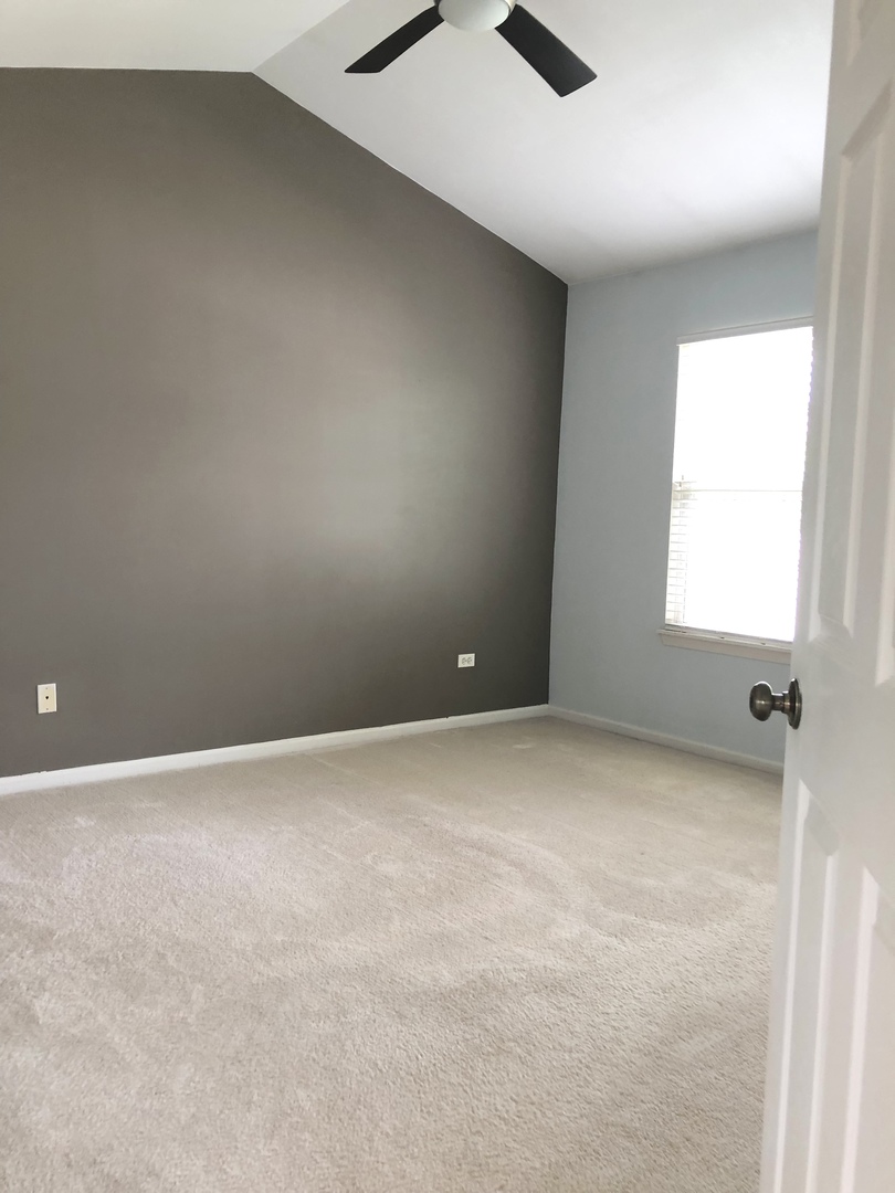 2330 Sheehan Drive Naperville, IL 60564 - Photo 11 of 18 an empty room with windows