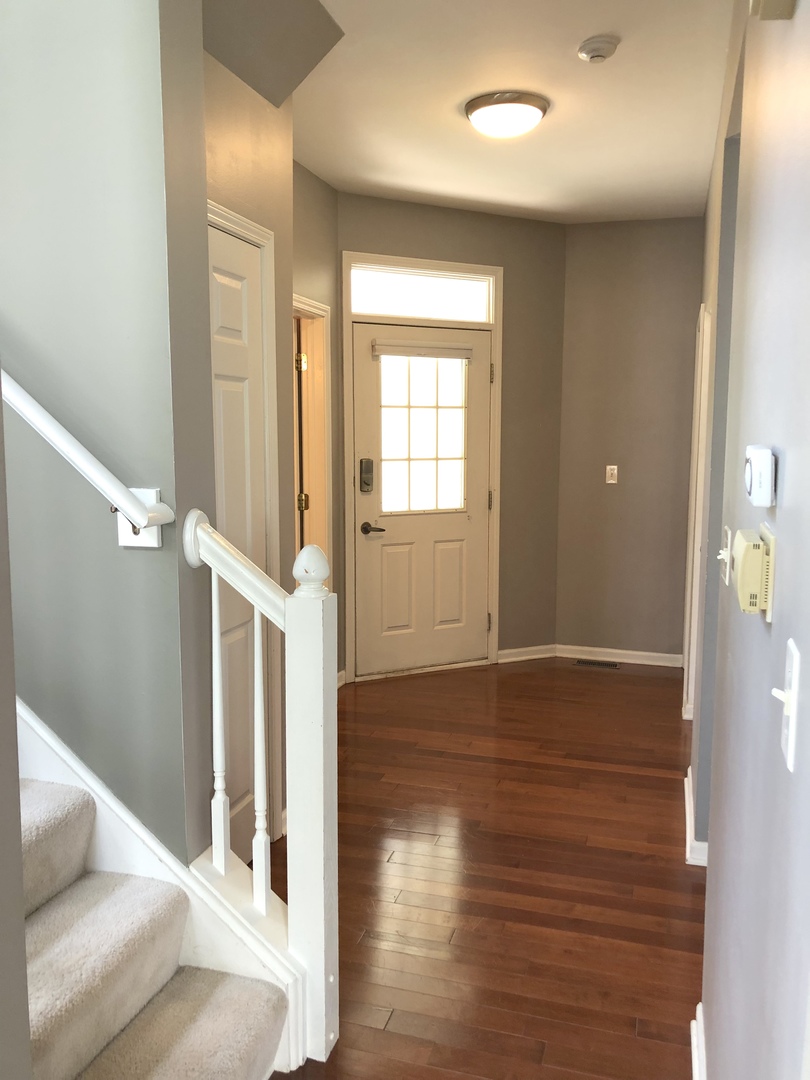 2330 Sheehan Drive Naperville, IL 60564 - Photo 2 of 18 a view of entryway with wooden floor