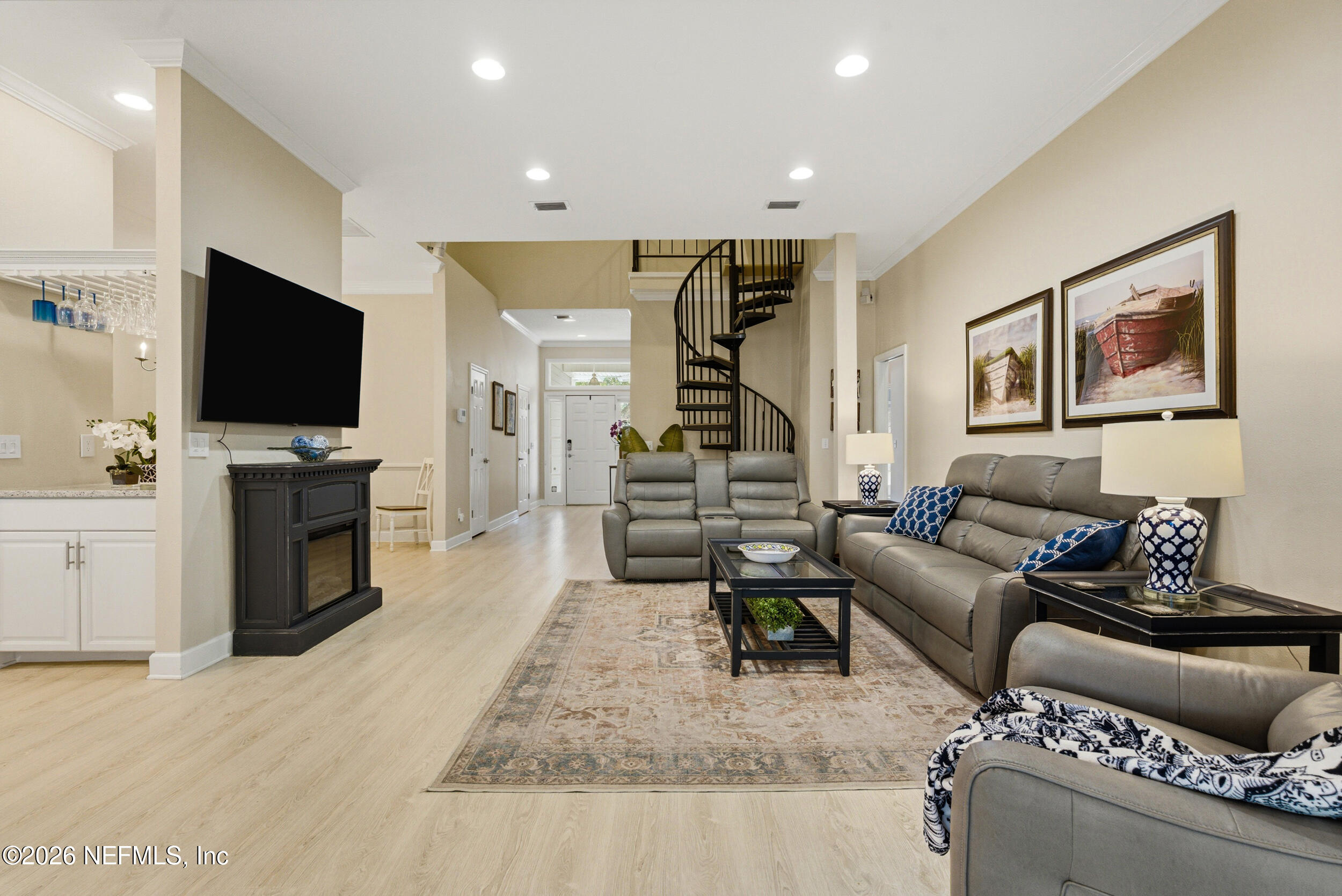118 3rd Street St. Augustine, FL 32084 - Photo 14 of 77 a living room with furniture and a flat screen tv