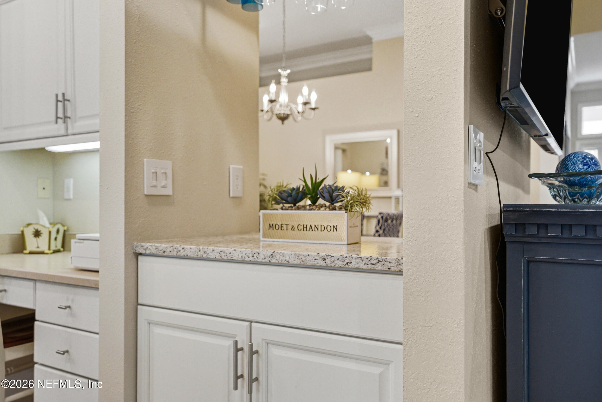 118 3rd Street St. Augustine, FL 32084 - Photo 25 of 77 a bathroom with a granite countertop sink and a mirror